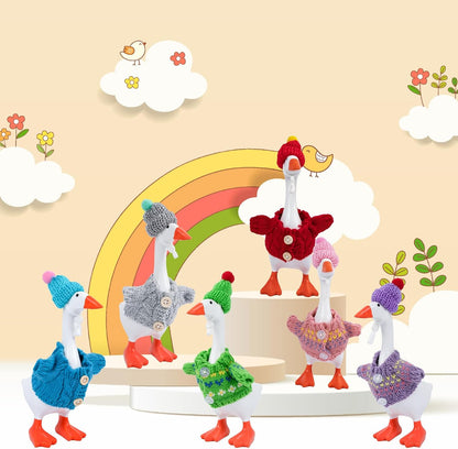 Six complete sets of winter miniature apparel organized by color for seven inch desk statues