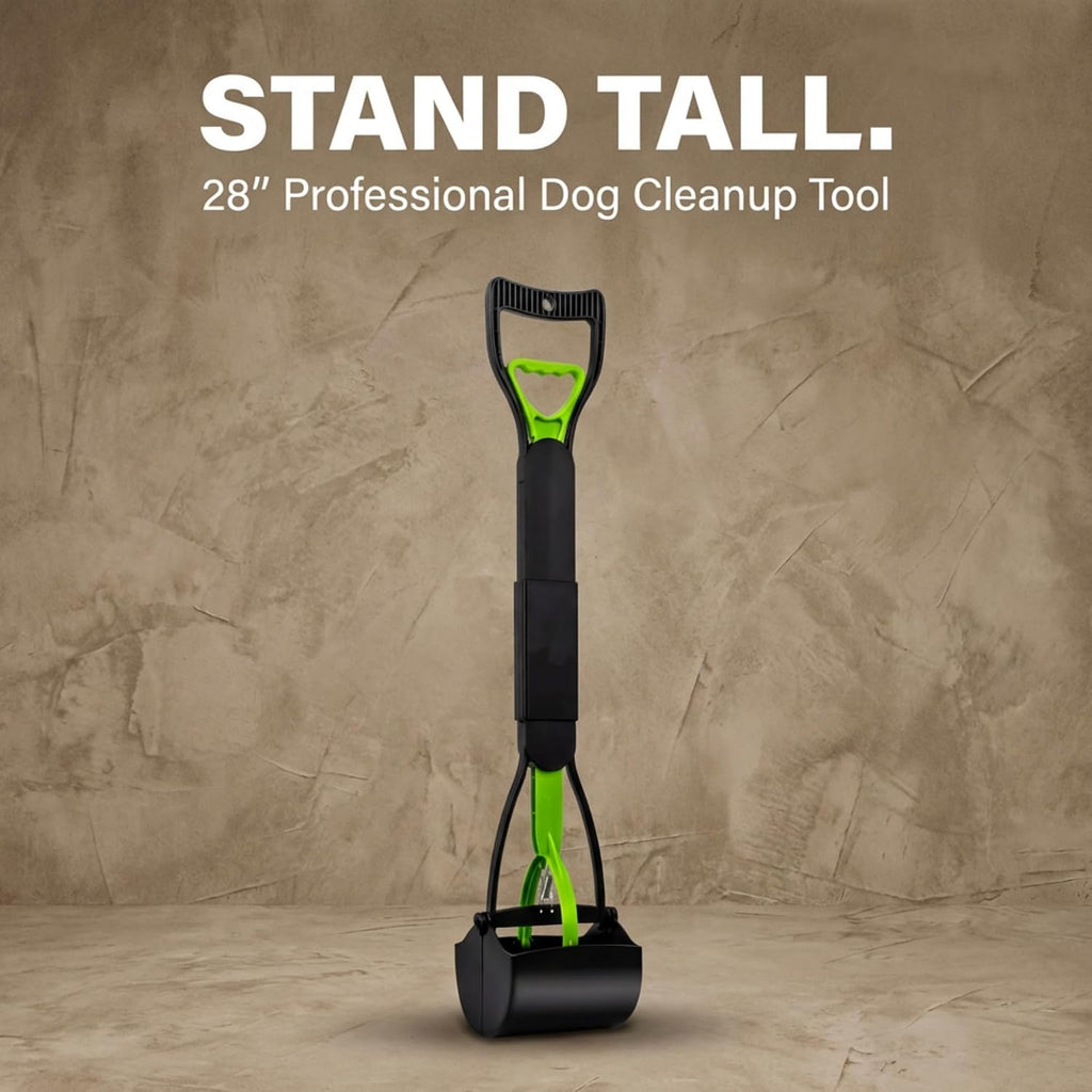 Long handle pet waste picker deployed for upright backyard cleanup.