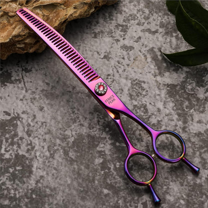 Professional rainbow dog shears alongside the included protective storage bag.