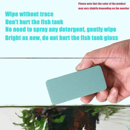 Handheld non scratch cleaning pad removing hard water stains from glass aquarium