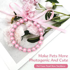 Close up shot of the sparkling rhinestone accents and imitation pearls on the pet jewelry.