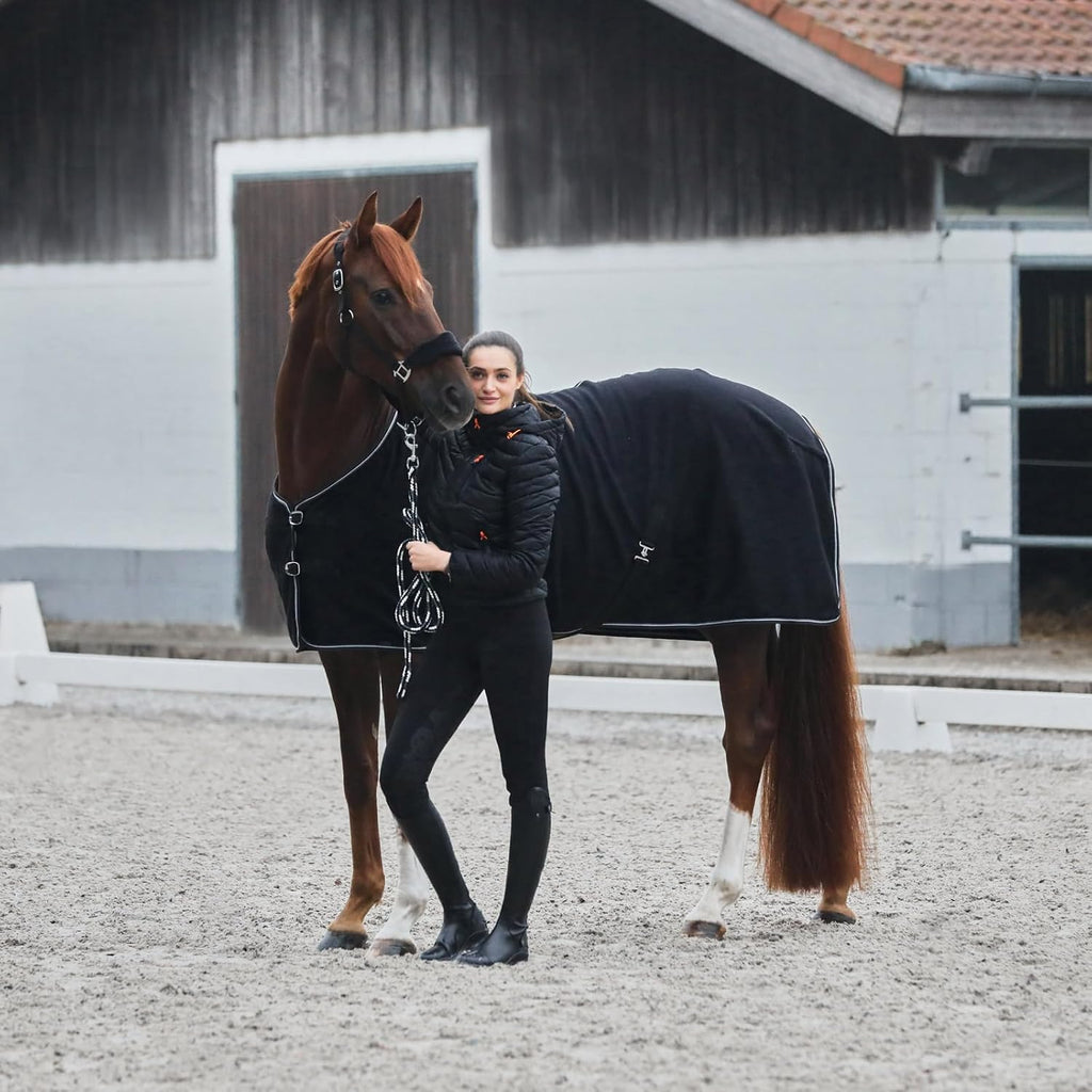 Black horse cooling blanket with cross surcingles and contrast piping details