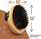 Close contact pet brush being held on a hand to demonstrate how it mimics a natural petting motion.