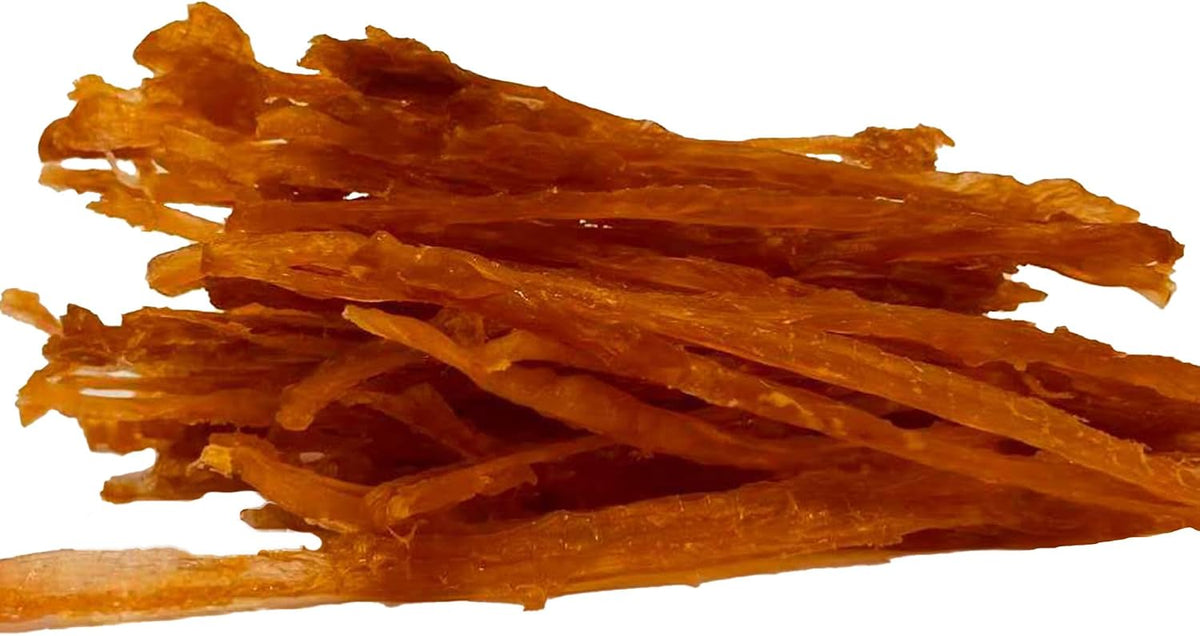 All natural rawhide free turkey tendon sticks for dogs showing fibrous texture.