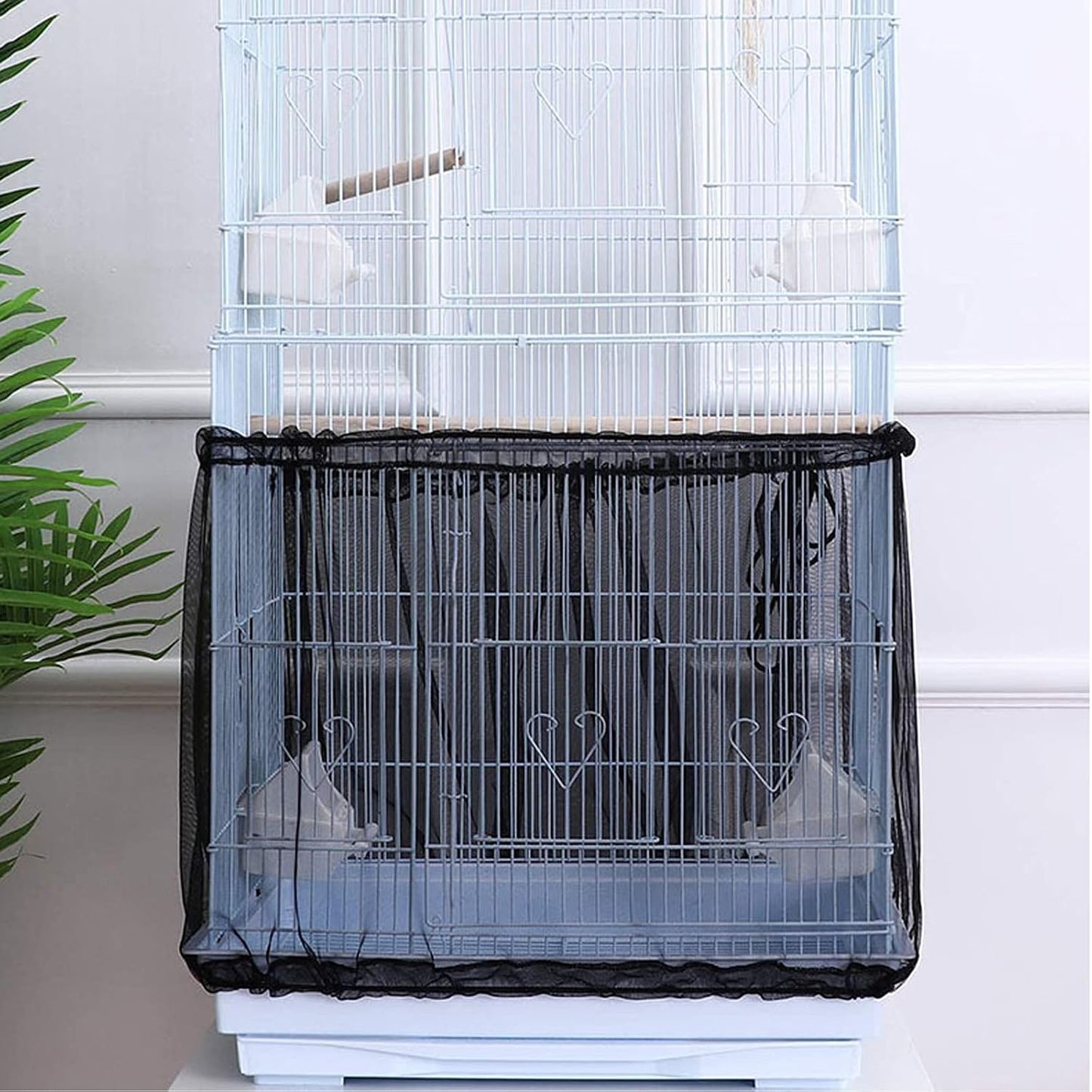 AIMICOCA seed catcher mesh shield demonstrating simple drawstring lock functionality for pet cages