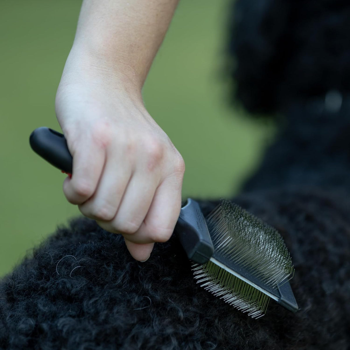 Jeffers flexible head pet slicker brush showing firm and extra firm stainless steel pins