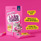 Owner hand feeding cat with Bonkers Licky Tubes