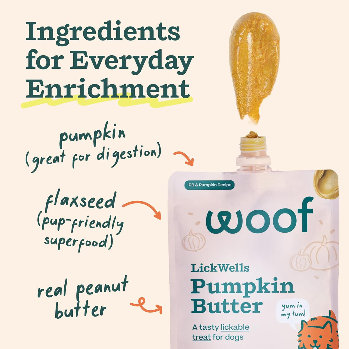 A happy dog enjoying the frozen WOOF pumpkin butter spread on a textured enrichment mat.