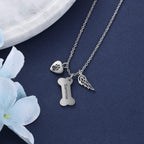 JewelOra dog memorial necklace highlighting the comforting angel wing charm accessory.