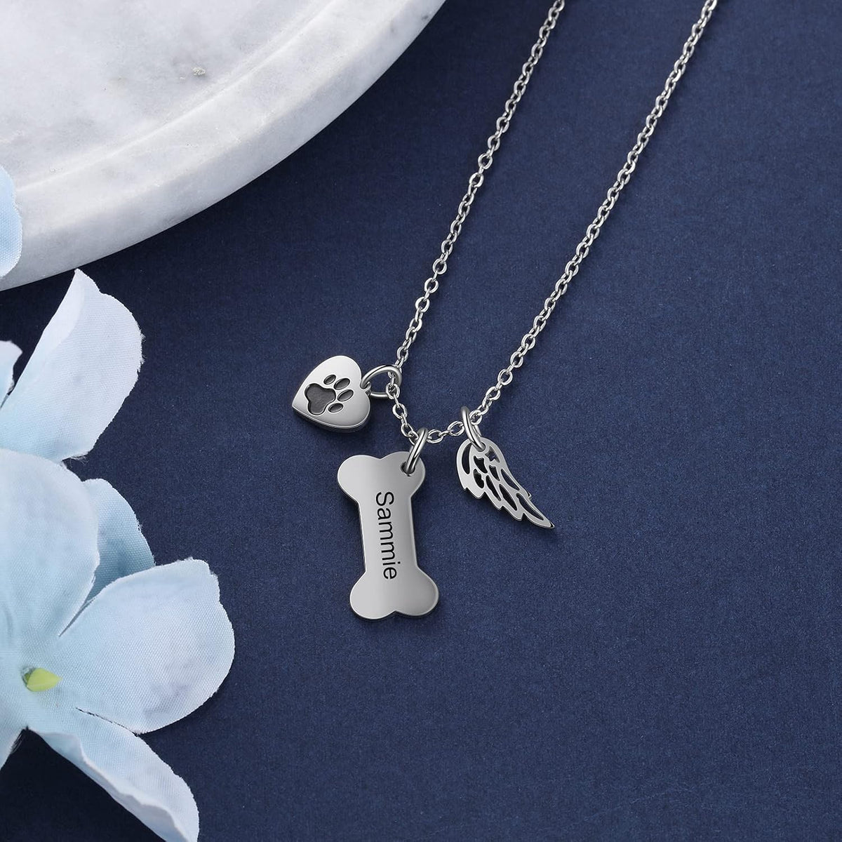 JewelOra dog memorial necklace highlighting the comforting angel wing charm accessory.