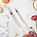 A selection of fifty individual sterile blister packs containing clear one milliliter syringes.