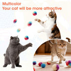 A collection of twenty assorted rainbow colored interactive kitty balls spread out for self play.