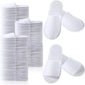 Coume disposable guest slippers front view bulk pack
