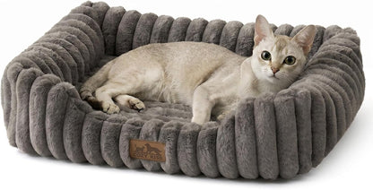 Cozy Kiss pet bed placed in a modern living room setting