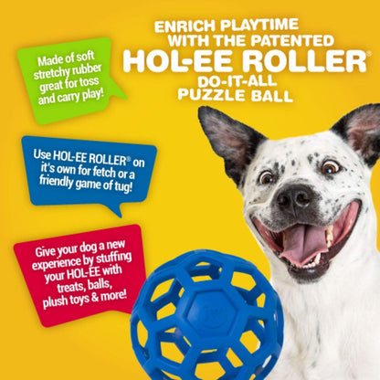 JW Pet Hol-ee Roller 3 inch dog toy held in hand for size reference