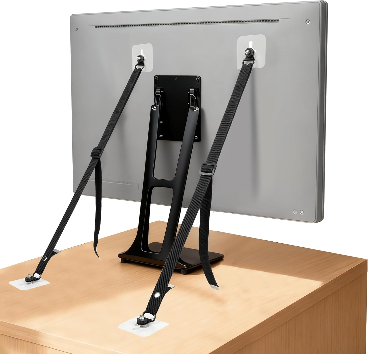 IMtKotW adjustable TV safety straps front view showing heavy duty black nylon cables and adhesive mounting pads.