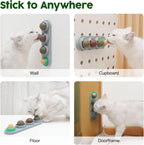 Adhesive base of Potaroma cat wall toy attached to surface
