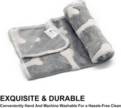Sorkut soft grey pet blankets neatly folded showing the star and bone prints.