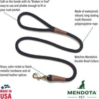 Close up of solid brass snap hook and oil-tanned leather splice.