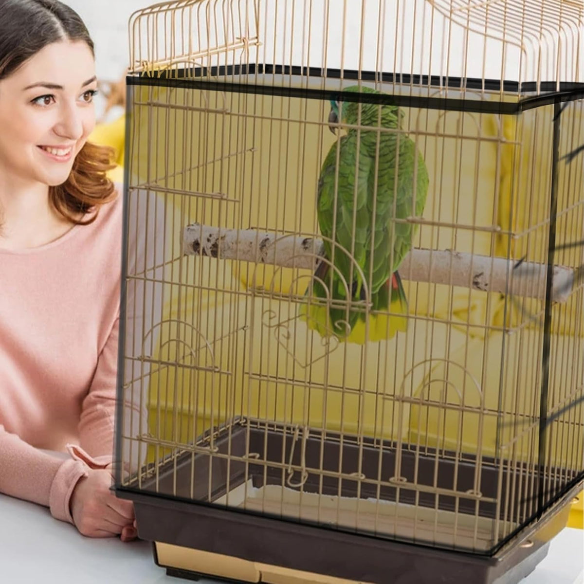 Bird cage skirt installed on a large round parrot cage