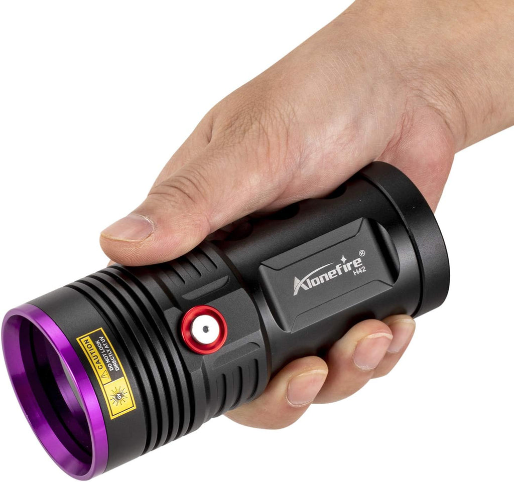 Alonefire H42UV ultraviolet light package contents with dark protective eyewear.