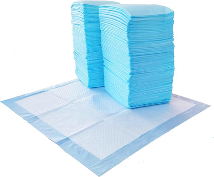 Amazon Basics leak-proof pet training pads on hardwood floor