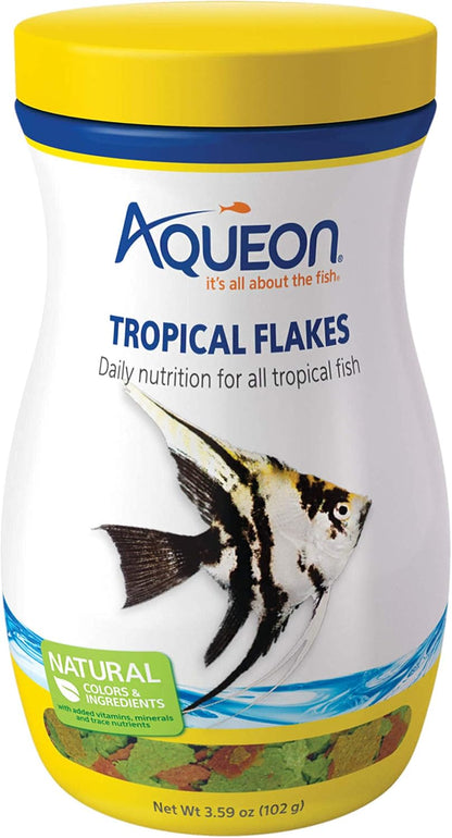 Aqueon fish food container with aquarium background