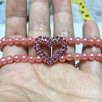 Close up of Petfavorites rhinestone heart pet jewelry