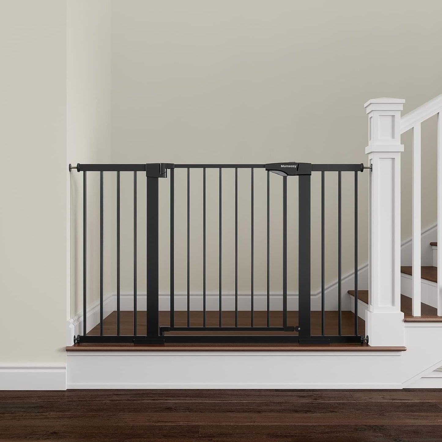 Mumeasy extra wide pressure mounted baby gate front view in black installed in a wide doorway