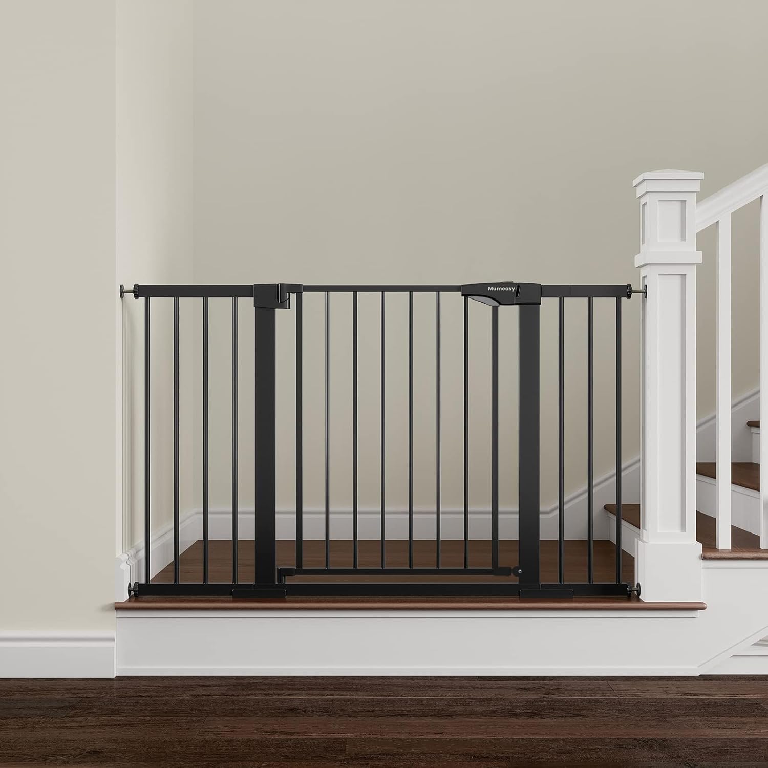 Mumeasy extra wide pressure mounted baby gate front view in black installed in a wide doorway