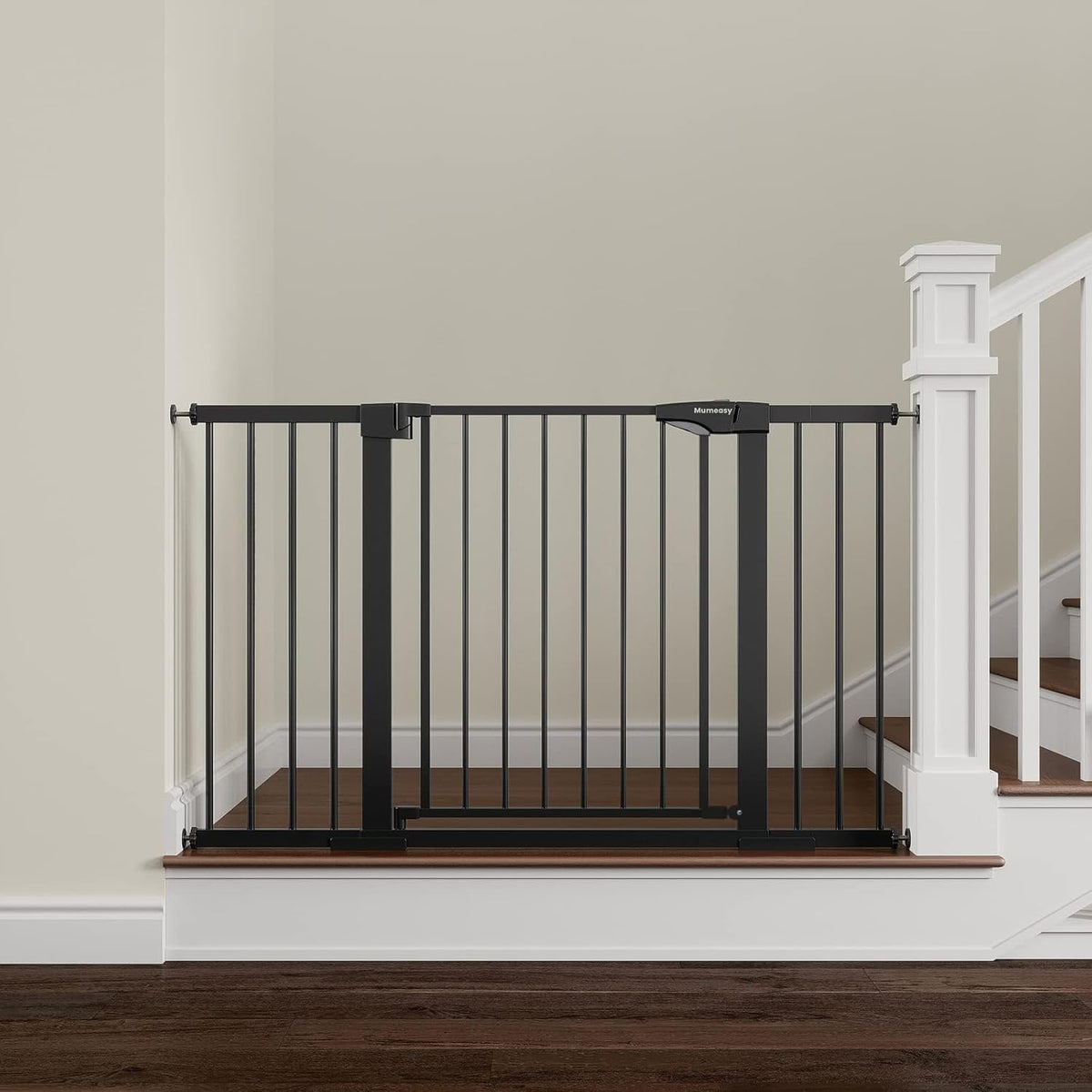Mumeasy extra wide pressure mounted baby gate front view in black installed in a wide doorway
