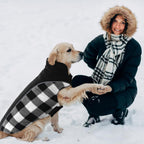 Small dog wearing Kuoser reversible winter jacket