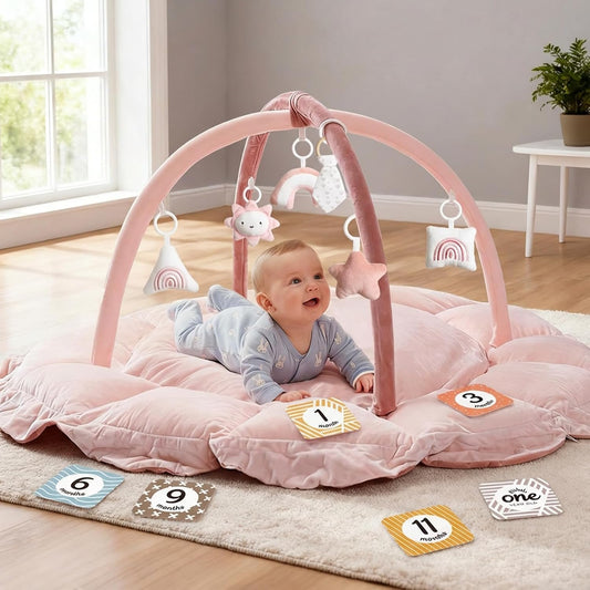Mallify 5-in-1 Thick Plush Baby Play Gym Mat pink front view showing arches and hanging toys.