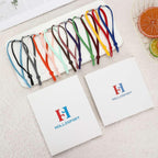 Complete set of sixty pieces premium imported HOLLOSPORT litter tracking bands for professional dog breeders.