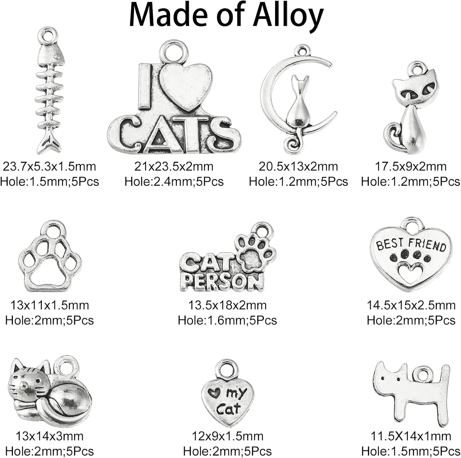 Variety of cat-themed Tibetan silver charms on a white background