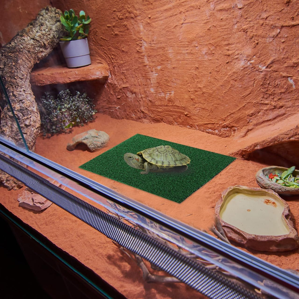 Yardwe artificial turf mat installed on a turtle basking platform setup.