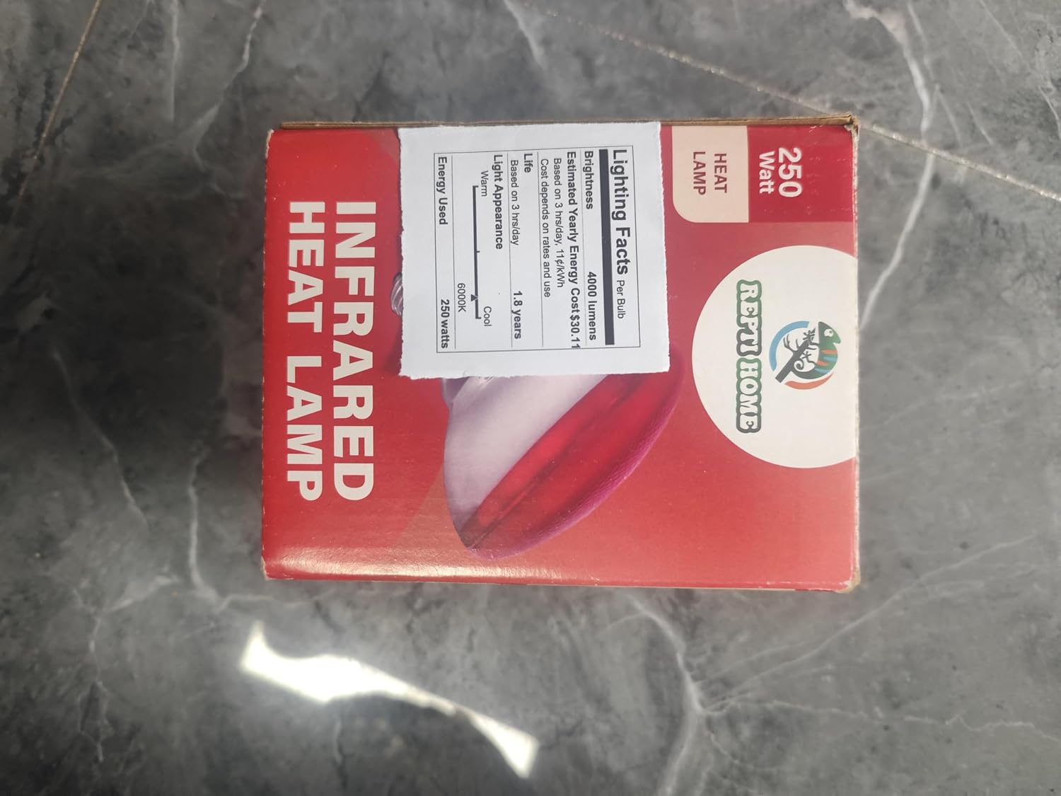 Generico 250W red heat lamp bulb showing universal screw thread connector.