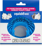 Squishface silicone grooming tool clearing debris from bulldog skin folds