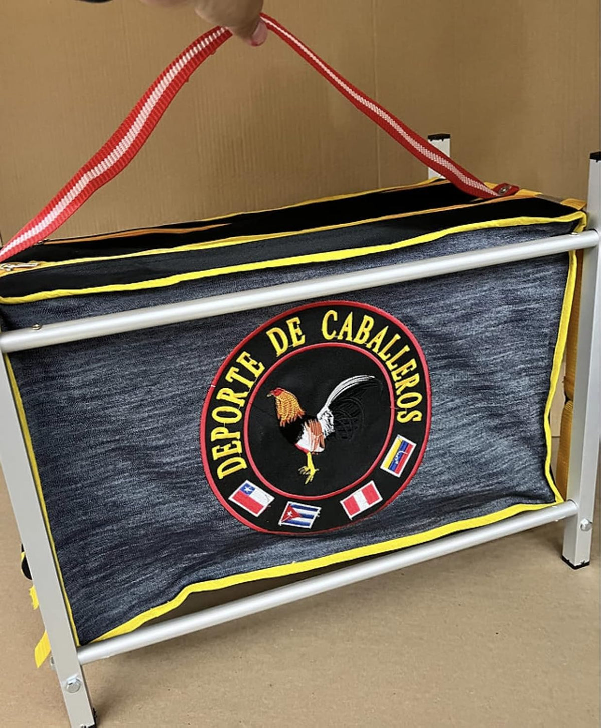Generic aluminum poultry carrier ready for travel