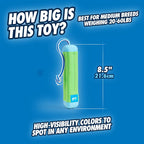 Small dog retrieving Chuckit! bumper toy from water