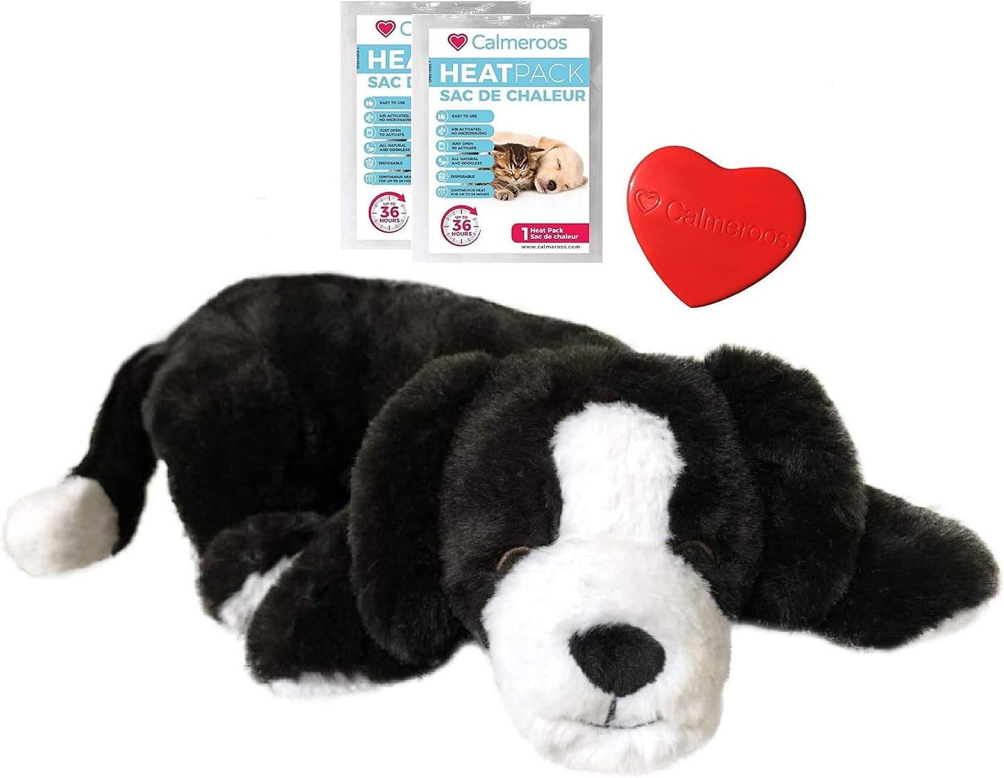 Anxious puppy and kitten sleeping beside realistic heartbeat simulator plush