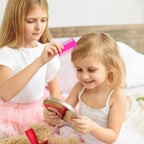 Pumtus plastic pet comb held in hand showing compact ergonomic size.
