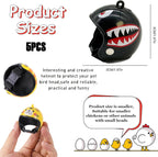 Novelty miniature poultry helmet used as a decorative keychain charm on a backpack