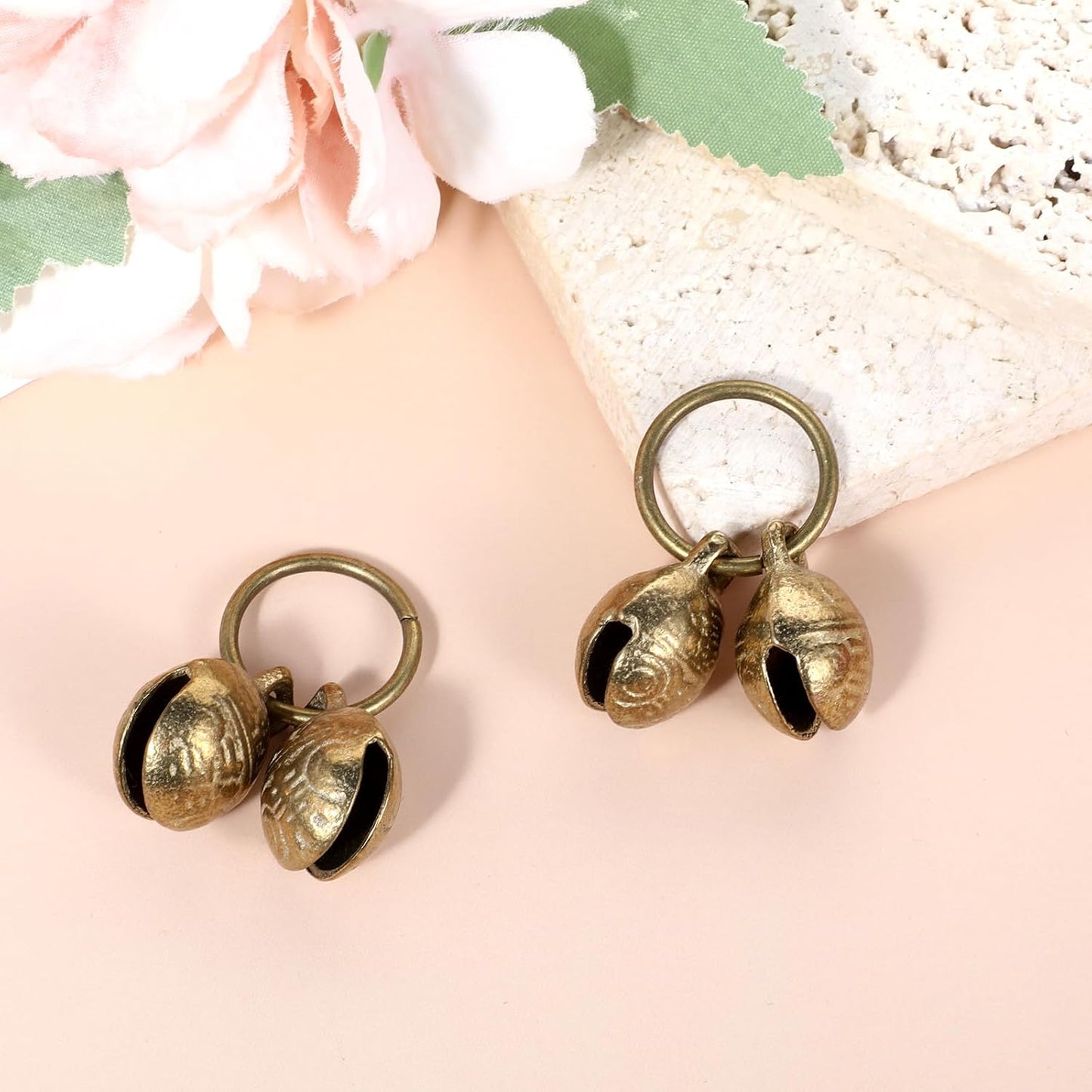 Close up view of the durable brass alloy construction of the Styquenzer pet bell.