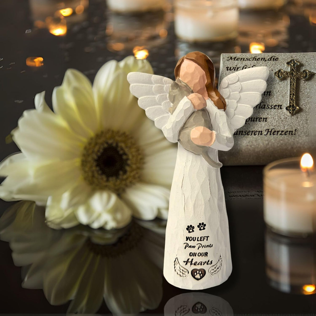 Angled view of 5.1-inch tall pet loss sympathy statue with angel holding a cat.