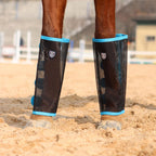 Side angle view of the tear resistant horsefly protection boots for pasture turnout.