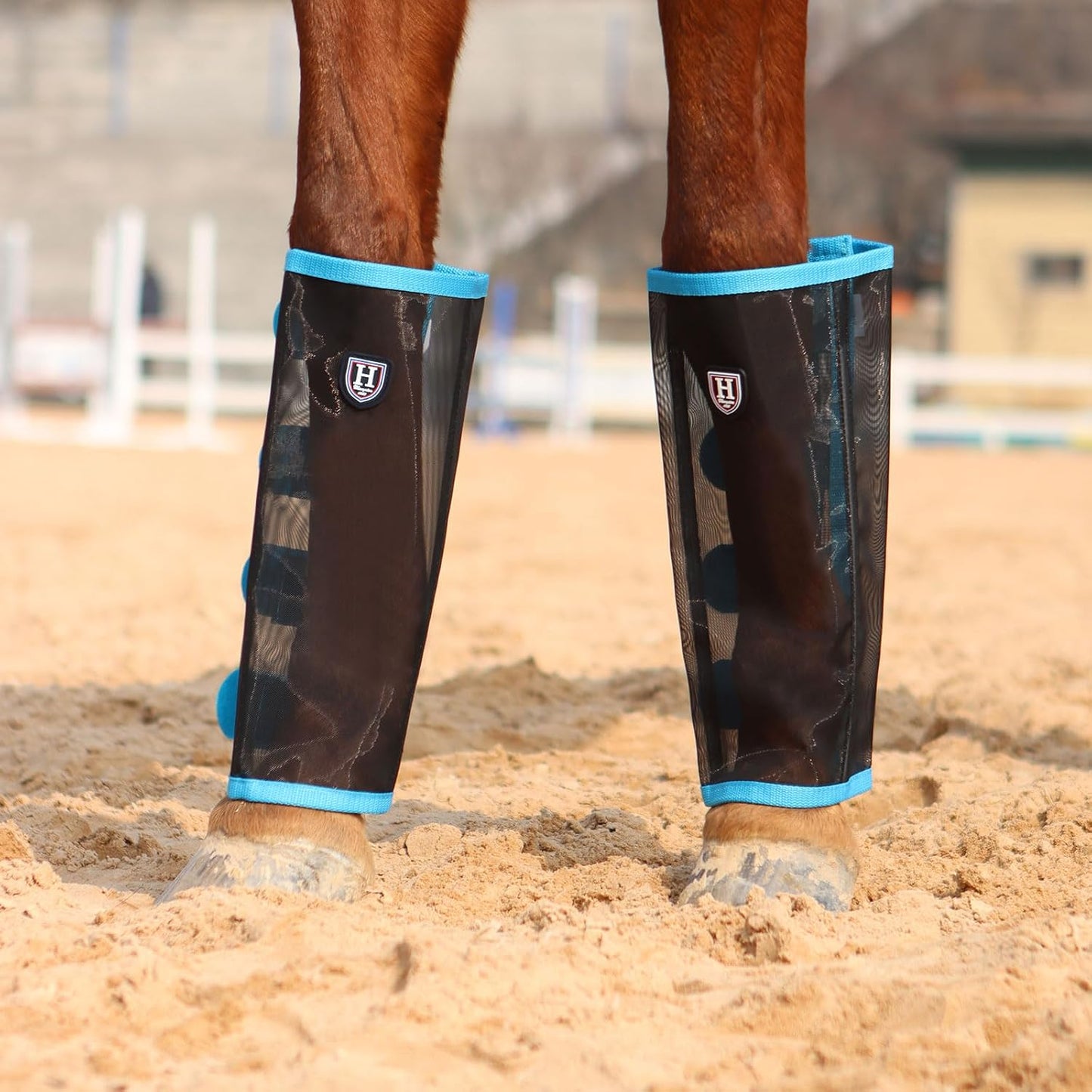 Side angle view of the tear resistant horsefly protection boots for pasture turnout.