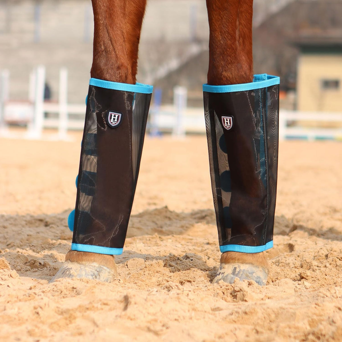 Side angle view of the tear resistant horsefly protection boots for pasture turnout.