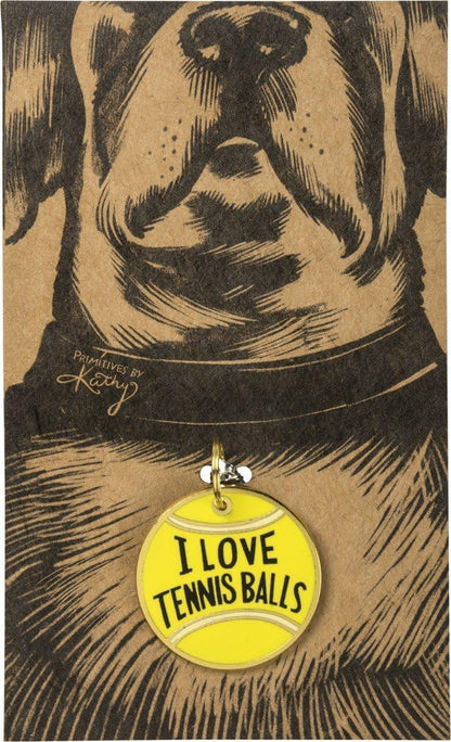 Close up of Primitives By Kathy tennis ball dog tag