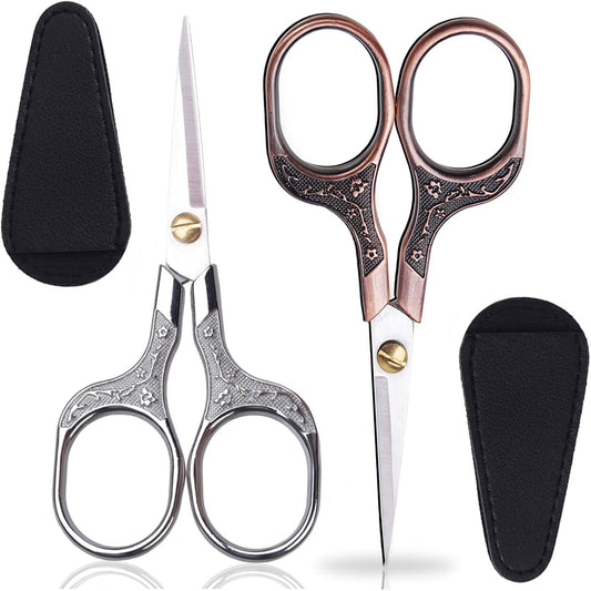 KISTARCH vintage precision scissors front view showing silver and copper red pairs